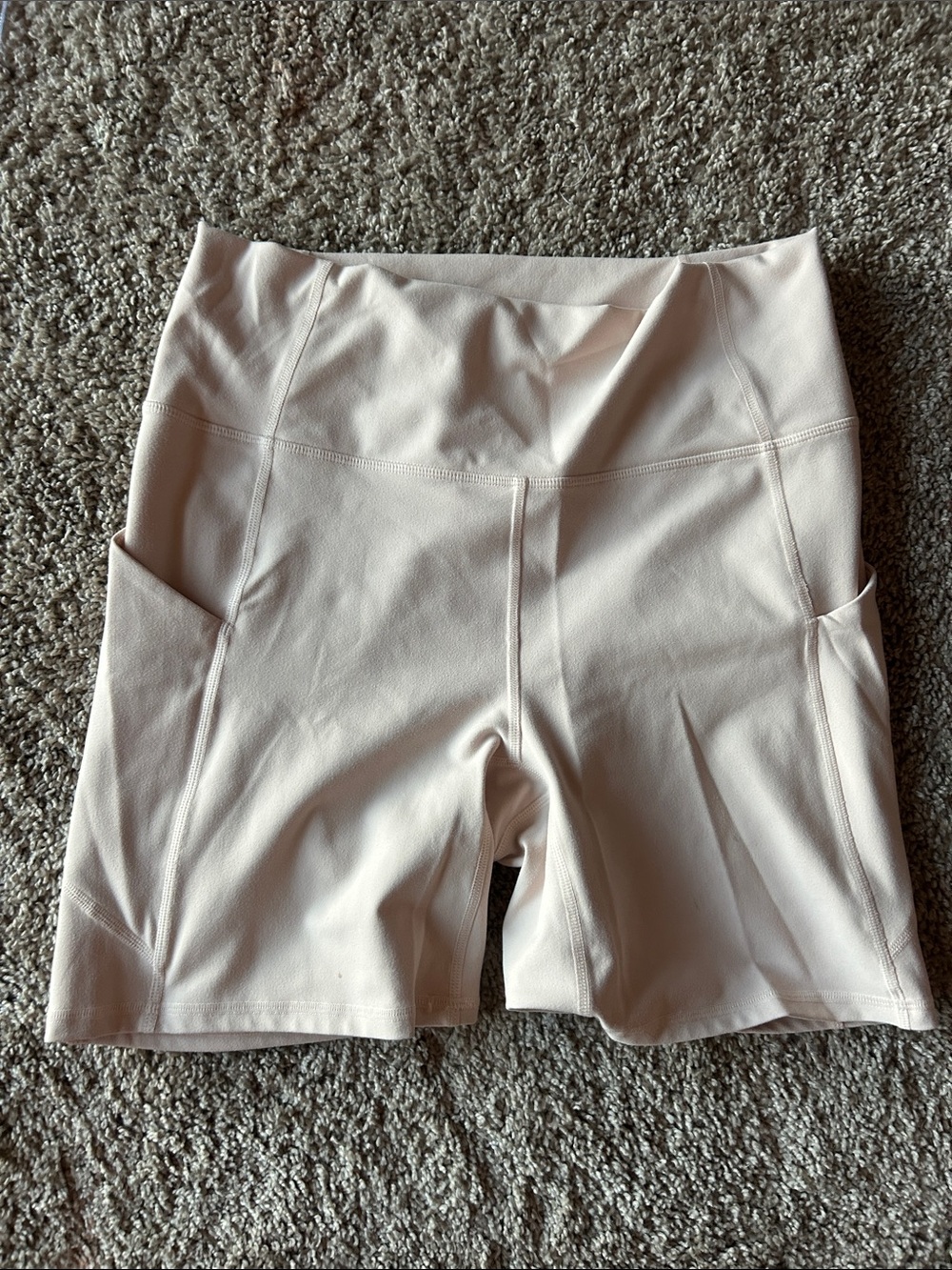 Fabletics Light Pink High-Rise Bike Shorts with Side Pockets